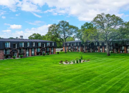 Lush Landscaping And Park Like Setting at Glen Oaks Apartments, Muskegon, MI