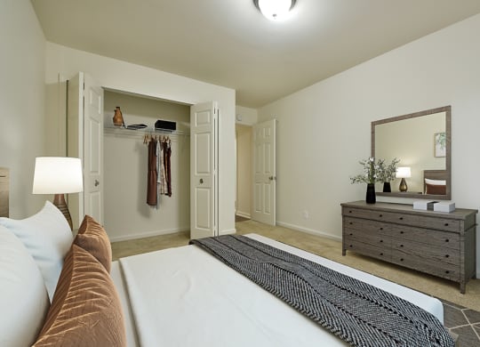 Bedroom With Closet at Grand Bend Club Apartments, Grand Blanc, MI