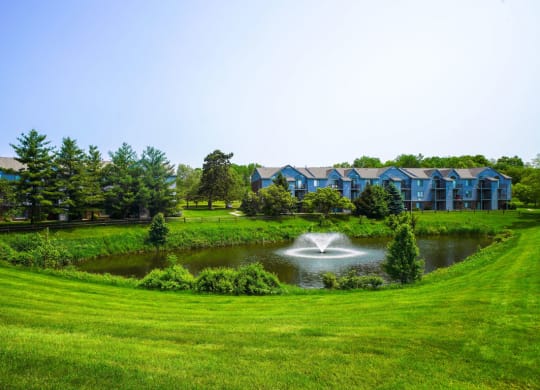 Acres of Green Lawns with a Pond at Green Ridge Apartments, Grand Rapids
