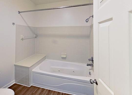 A master bathroom with a whirlpool tub at Foxwood and The Hermitage, Michigan, 49024