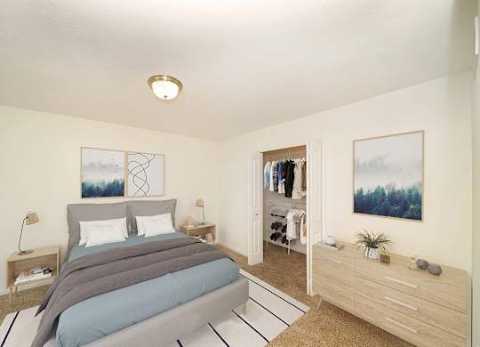 a bedroom with a bed and a walk-in closet at Foxwood and The Hermitage, Portage