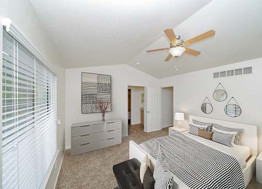 Master bedroom with vaulted ceiling at Foxwood and The Hermitage, Michigan