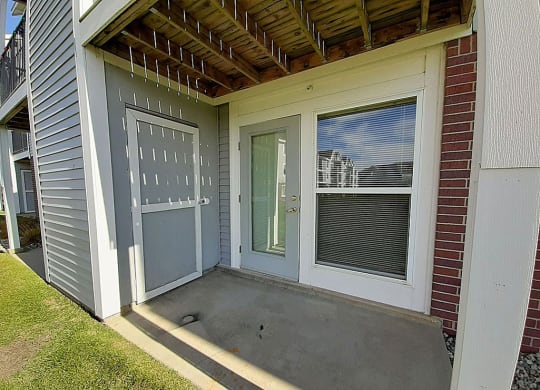 French Door to Private Patio at Hunters Pond Apartment Homes in Champaign, IL