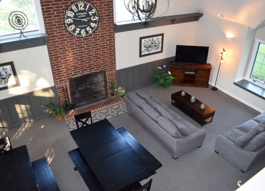 Fireplace In Clubhouse Lounge Area at Indian Lakes Apartments, Mishawaka, Indiana