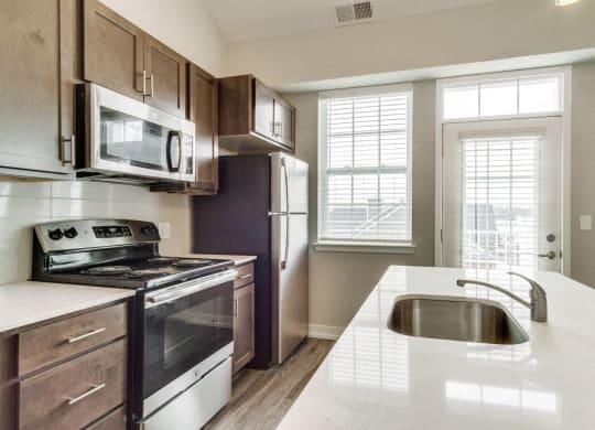 Kitchen (Hickory) at Village Place Apartments, Romeoville, 60446