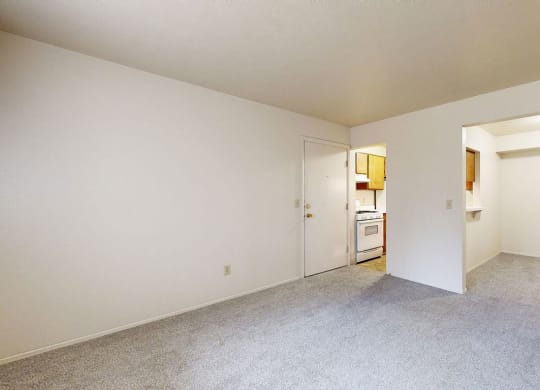 Open living and dining areas with a breakfast bar at Irish Hills Apartments, South Bend