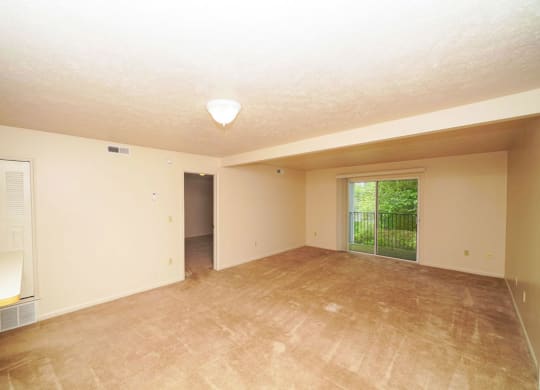 the living room and dining room of a two bedroom apartment at Liberty Mills Apartments, Fort Wayne