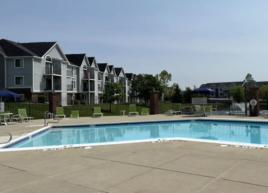 Relaxing Swimming Pool with Lounge Chairs at Liberty Mills Apartments, Fort Wayne, IN, 46804