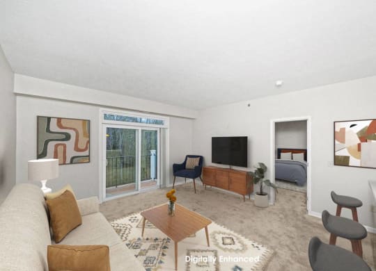a living room with a couch and 9' ceiling at Limestone Creek Apartment Homes, Madison, AL