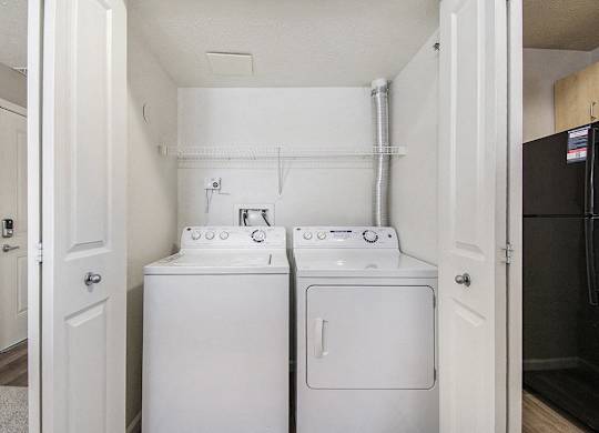 A full size washer and dryer at Lynbrook Apartments and Townhomes, Elkhorn, NE, 68022