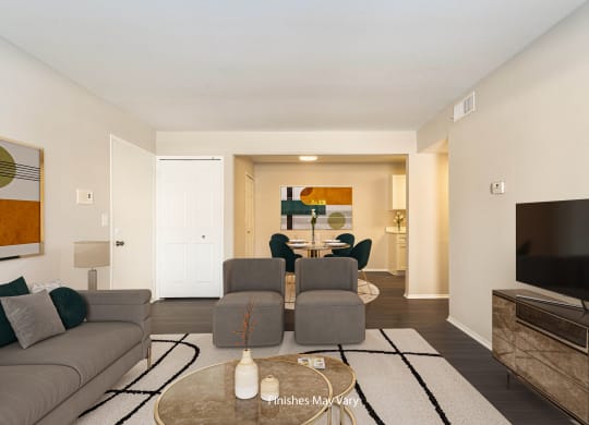 Magnolia Renovated Living Area with Vinyl at Bristol Square and Golden Gate Apartments in Wixom, MI