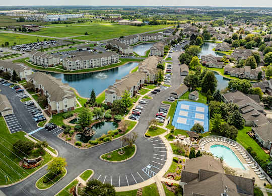 A large, well-maintained residential area with a swimming pool and a roundabout at Mallard Bay Apartments, Crown Point, Indiana