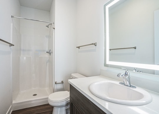 a bathroom with a sink toilet and shower at Meadowbrooke Apartment Homes, Grand Rapids, Michigan
