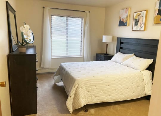 Spacious Master Bedroom at Wood Creek Apartments in Kenosha, WI