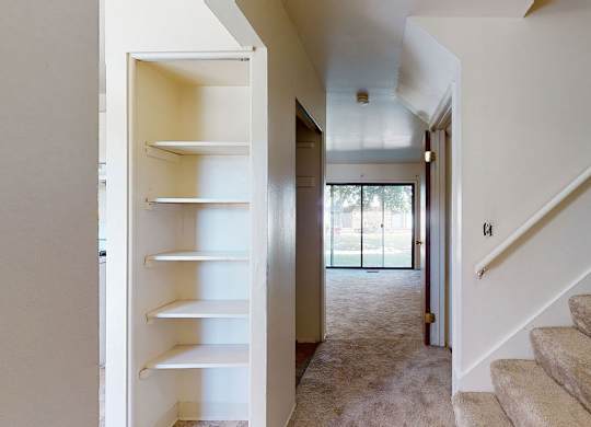 An entryway leading to sliding glass doors to a patio at Mount Royal Townhomes, Kalamazoo, MI