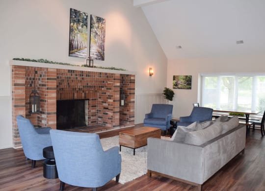 Clubhouse with High Ceiling and Fireplace at Newport Village Apartments, Portage, MI