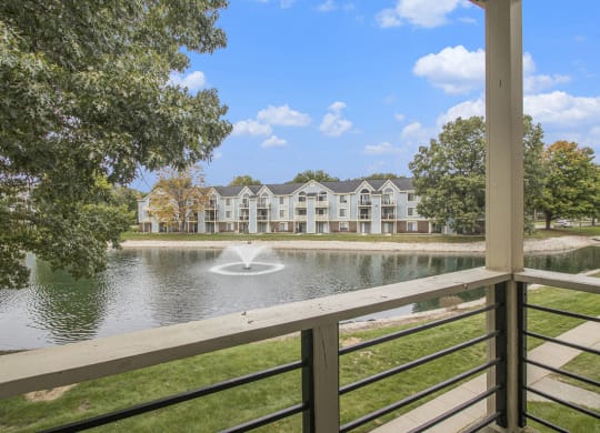 private balcony with a pond view at North Pointe Apartments in Elkhart, IN