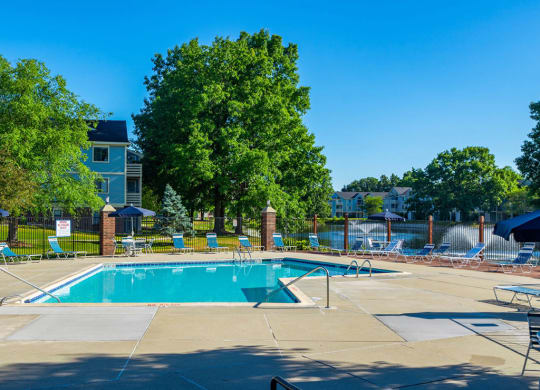 Relaxing Swimming Pool With Sundeck at North Pointe Apartments, Elkhart, IN