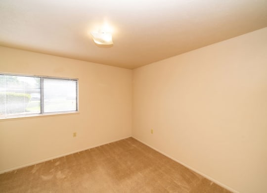 Residential Room With Window at North Pointe Apartments, Elkhart, Indiana