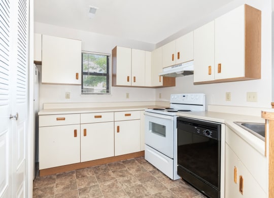 End Kitchen with Window at Oak Shores Apartments in Oak Creek, WI