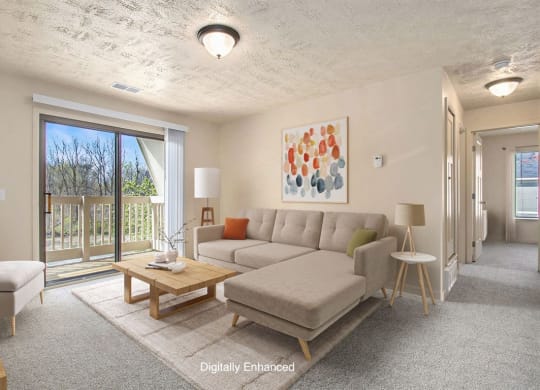 living room with a sliding glass door to a balcony at Old Farm Apartments, Elkhart, Indiana