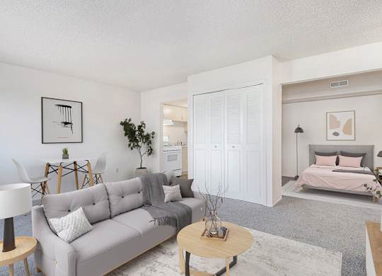 a living room with a couch and a bed at Old Farm Apartments, Elkhart, 46517