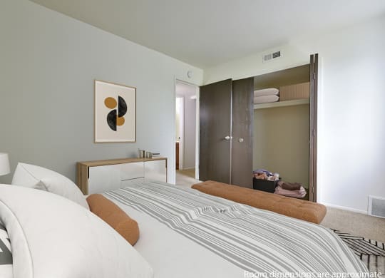 Bedroom With Closet at Perry Place Apartments, Grand Blanc, Michigan