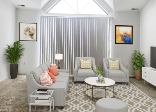 a rendering of a living room with a vaulted ceiling and skylight  at Northport Apartments, Macomb, MI, 48044
