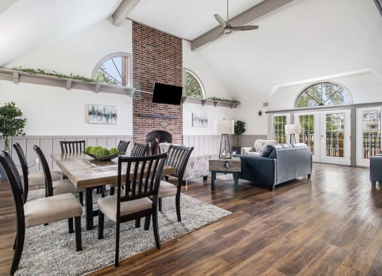 Expansive clubhouse with fireplace wall at Pine Knoll Apartments, Battle Creek