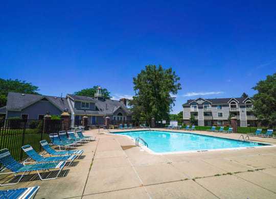 Poolside Relaxing Area at Pine Knoll Apartments, Michigan