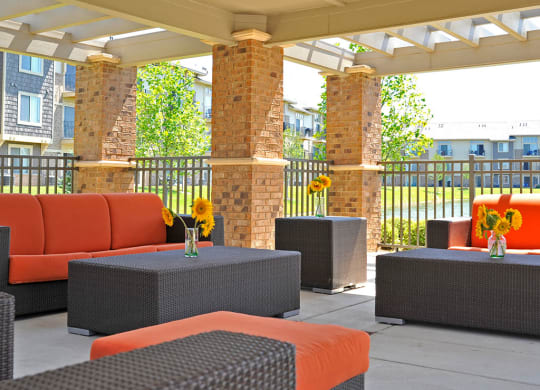 Shaded Outdoor Lounge Area at Prairie Lakes Apartments, Peoria, IL, 61615