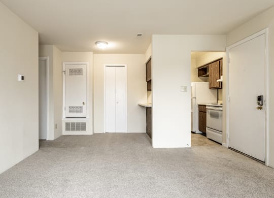 a renovated living room and kitchen in an apartment at Scarborough Lake Apartments, Indianapolis, 46254