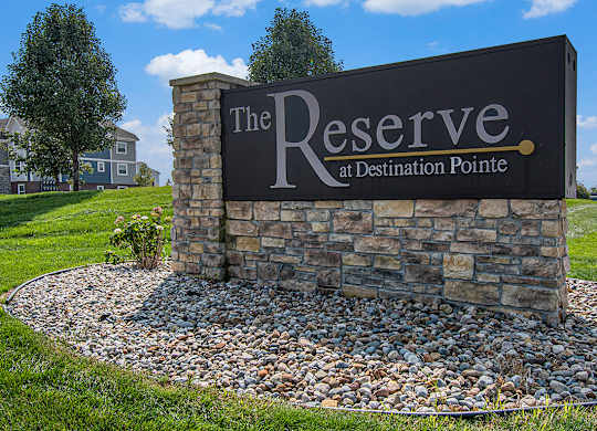 A sign that says The Reserve at Destination Pointe at The Reserve at Destination Pointe, Grimes, Iowa