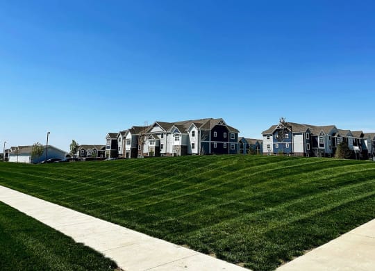 Green Lawns at The Reserve at Destination Pointe Apartments in Grimes, Iowa