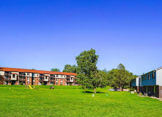 Large Green Community with Playground at Seville Apartments, Michigan