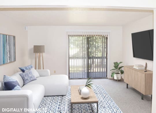 living room with a sliding glass door at Seville Apartments in Kalamazoo, MI 49009
