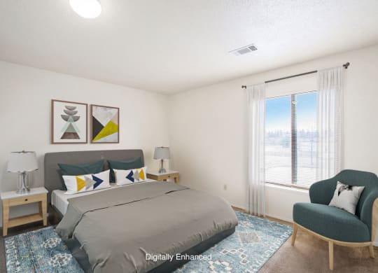 a bedroom with a large window at Seville Apartments, Kalamazoo, MI, 49009