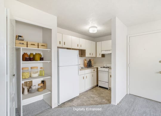 studio kitchen with ample closet space at Seville Apartments in Kalamazoo, MI 49009
