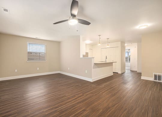 enlarged living room with a hard surface flooring at Stoney Pointe Apartment Homes, Wichita