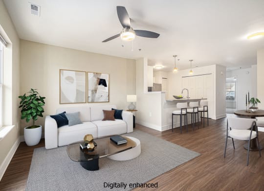 living room with hard surface floors at Signature Pointe Apartment Homes in Athens, AL