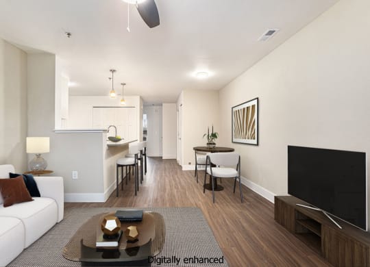 open floor plan with kitchen breakfast bar at Signature Pointe Apartment Homes in Athens, AL