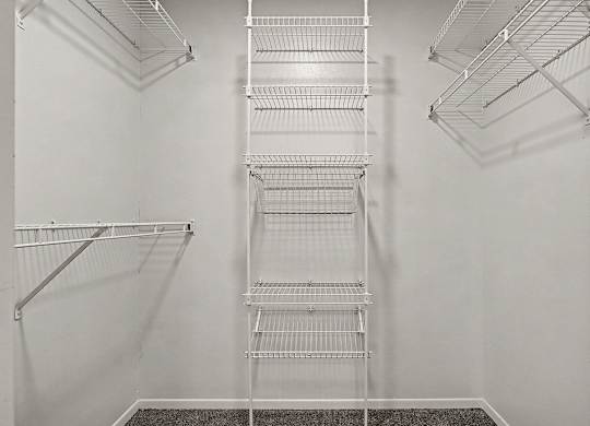 Empty shelves in a white room.
