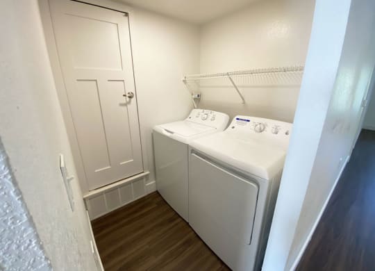 Separate Laundry Room at Stoney Pointe Apartment Homes in Wichita, KS