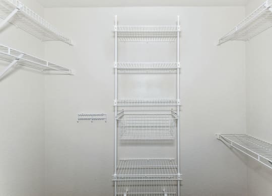 Walk In Closet with Organizers at Stoney Pointe Apartment Homes in Wichita, KS