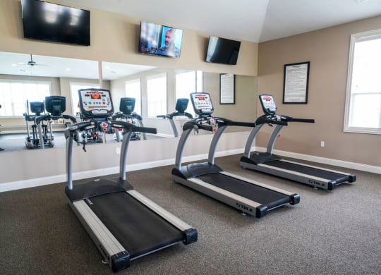 Fitness Center with Cardio Machines at Stoney Pointe Apartment Homes, Kansas 67226