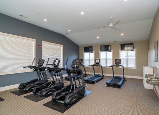 Cardio Machines In Gym at Strathmore Apartment Homes, Iowa