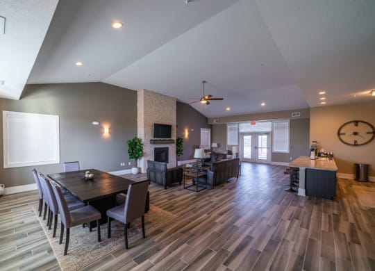 Clubroom With Smart Tv And Fireplace at Strathmore Apartment Homes, Iowa