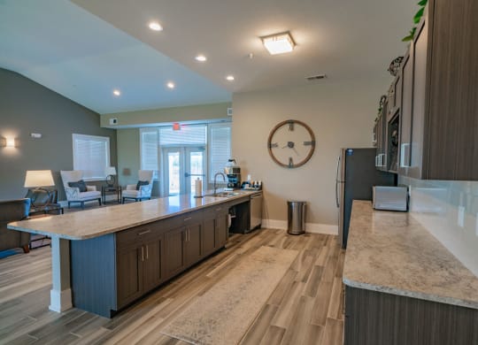 Equipped Kitchen In Clubhouse at Strathmore Apartment Homes, West Des Moines, IA, 50266