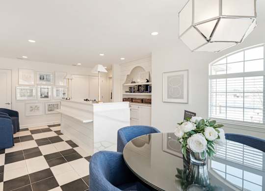 A black and white checkered floor in a well lit room. at Sundance Apartments, Indianapolis, Indiana