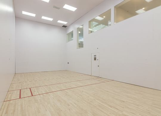 A room with a wooden floor and a red line running across it. at Sundance Apartments, Indianapolis, 46237
